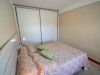 Dormitorio con aire acondicionado