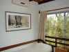 Dormitorio con aire acondicionado