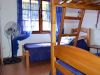 Dormitorio con tres plazas