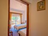 Dormitorio con balcón