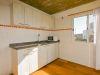 Cocina con muebles bajo mesada 