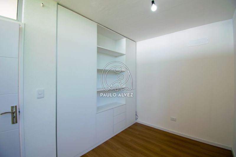 Dormitorio con placares